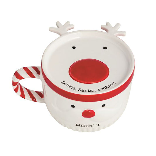 Reindeer-shaped mug with candy cane handle on a white background