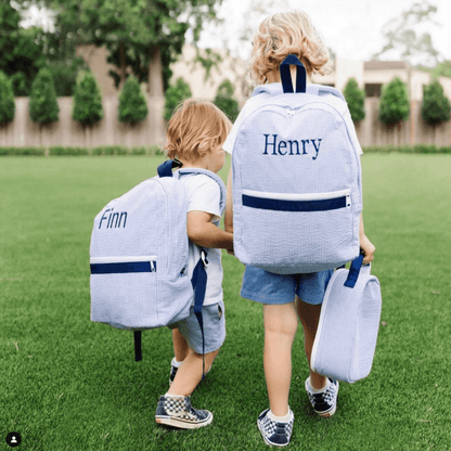Oh Mint! Monogrammed Navy Seersucker Medium Backpack | CeCe's Home & Gifts