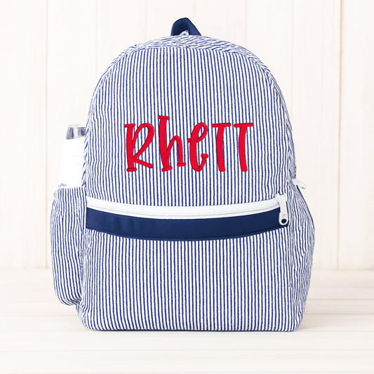 Oh Mint! Monogrammed Navy Seersucker Medium Backpack | CeCe's Home & Gifts